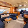 Air-conditioned salon with leather sofas on the My Toy yacht