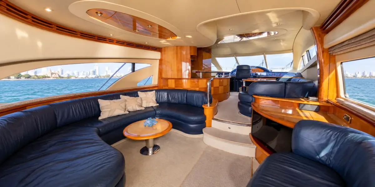Air-conditioned salon with leather sofas on the My Toy yacht