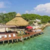 Overwater deck with sun loungers at Isla Gigi