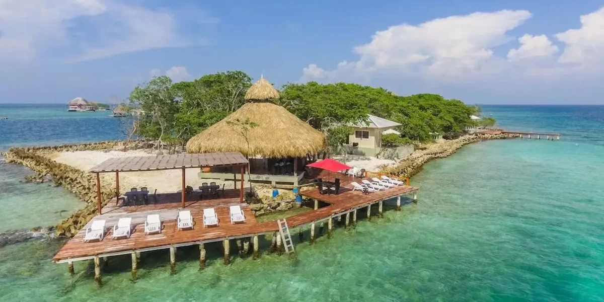 Overwater deck with sun loungers at Isla Gigi