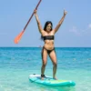 Paddleboard in clear water at Paue Beach Club, Cartagena