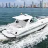 Palladium yacht for rent in Cartagena sailing with the city behind