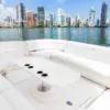 Outdoor lounge with table on the deck of the Palladium yacht