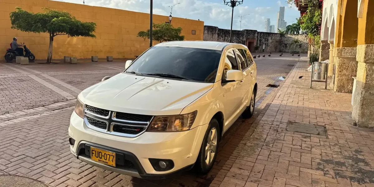 White Dodge Journey SUV for private transfers in Cartagena Old Town