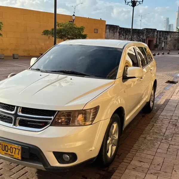 White Dodge Journey SUV for private transfers in Cartagena Old Town