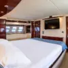 VIP cabin with double bed and TV on the Suerte yacht