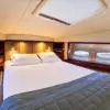 Guest cabin with double bed on the Suerte yacht