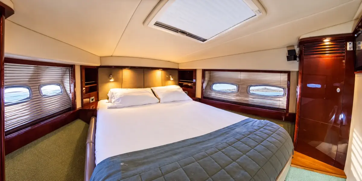 Guest cabin with double bed on the Suerte yacht