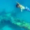 Snorkeling over the sunken plane in the Rosario Islands
