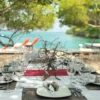 Table set for lunch by the sea at Coralina Island