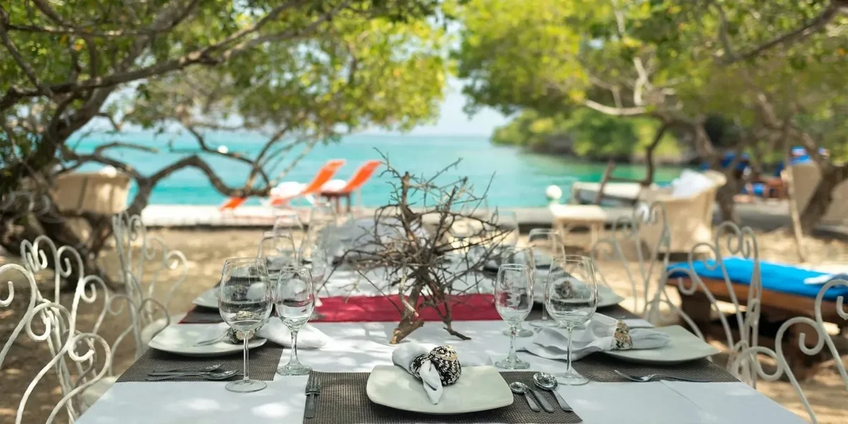 Table set for lunch by the sea at Coralina Island