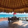 Thatched palapa dining area at Isla Gigi