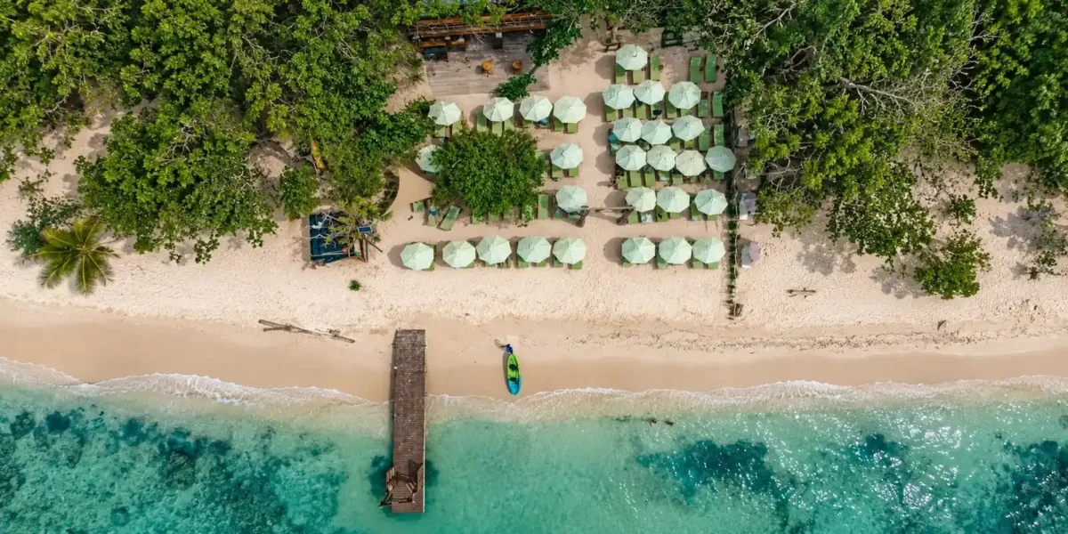 Top-down aerial view of Mantas Beach Club umbrellas