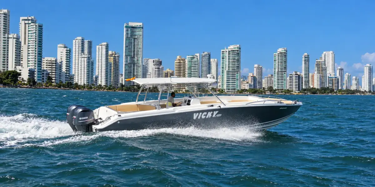 Vicky 420 42 ft private boat cruising past the Bocagrande skyline, Cartagena