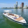 Virginia 420 private boat with tan sunbeds in front of Bocagrande
