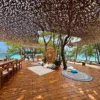 Wooden terrace under the trees at Corona Island
