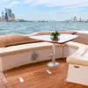 Aft deck seating with table and Bocagrande view on the Zetta yacht