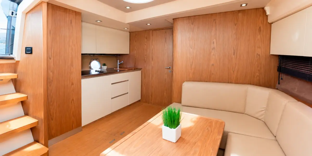Galley and indoor lounge on the Zetta yacht